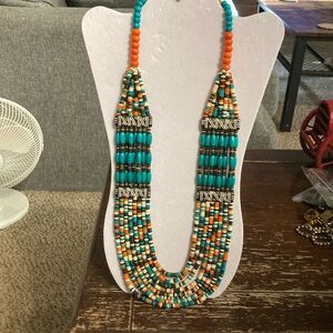 Vintage wood bead necklace. Multi strand . Bright fall colors